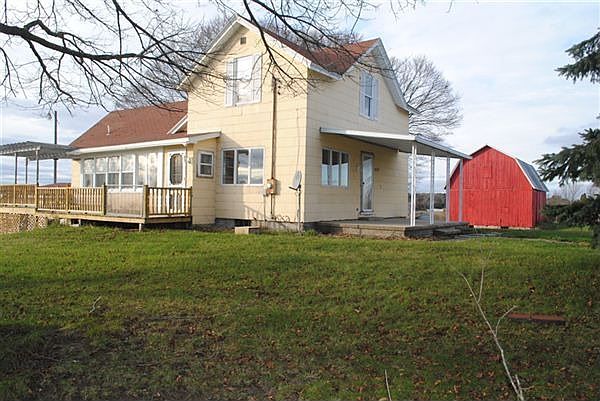 Farm house with barn and pastures