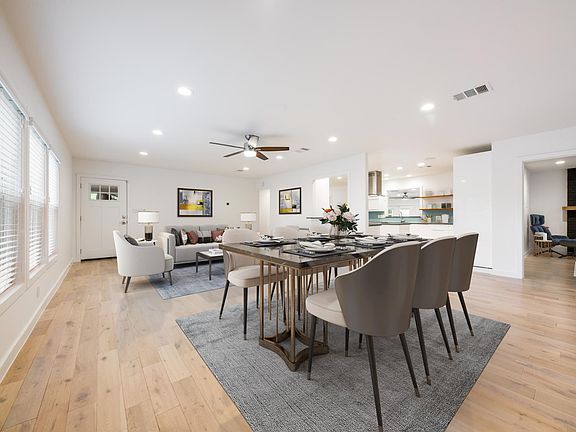 Virtually staged living/dining.