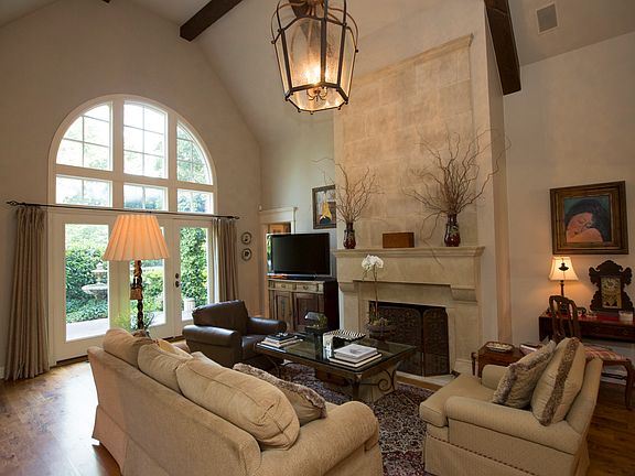Living area off kitchen with wood burning fireplace