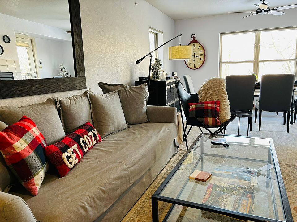 Living room with sofa sleeper and 50" TV.