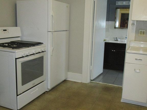 stove/refrigerator....also entry to bathroom from kitchen