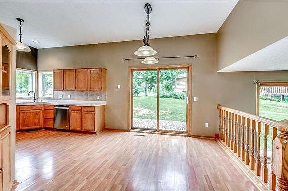Open floor plan between kitchen, dining room and family room
