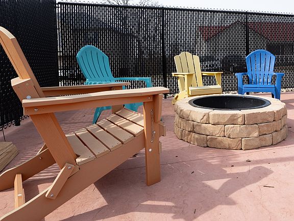 Stone Fire PIt with outdoor seating