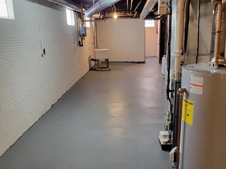 Basement leading to rear common hallway with lockable door.