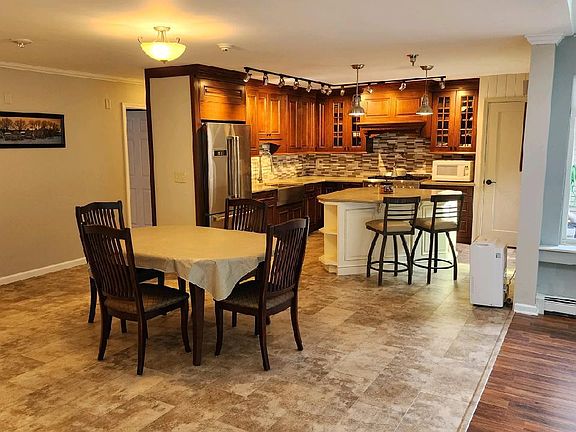 Dining room area with table included.