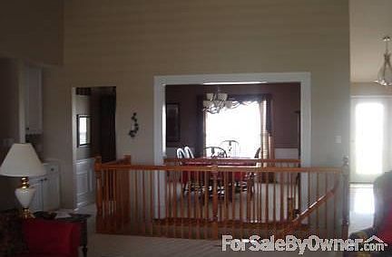 Dining Room w/Vaulted Ceiling
						:
						Wainscoting chair rail Hght. 
Open floor plan