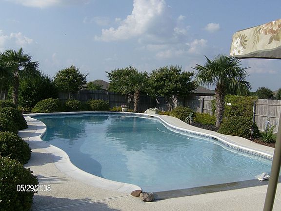Beach Entry pool and extensive landscape