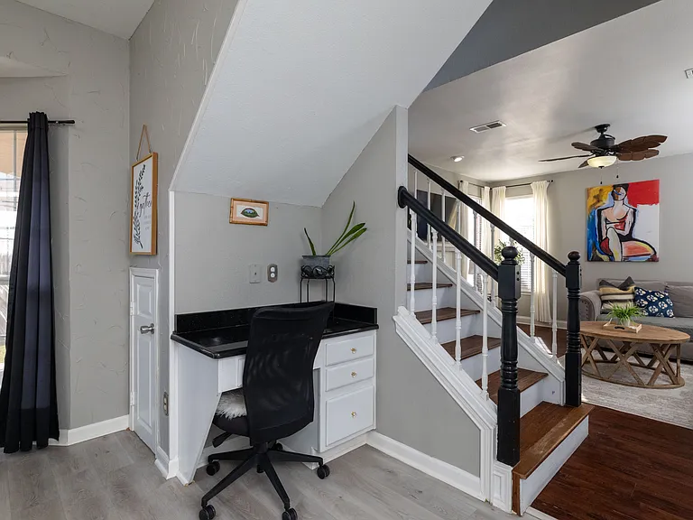 Dedicated built-in workspace under the stairs.