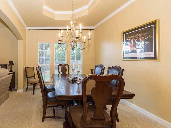 Formal dining room with cove ceiling