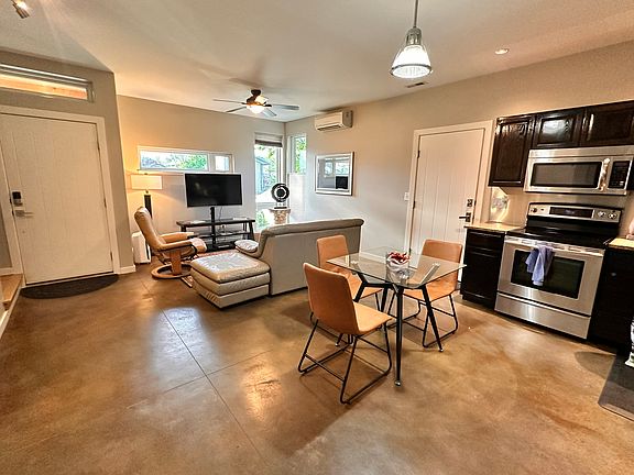Front entrance, living area and kitchen
