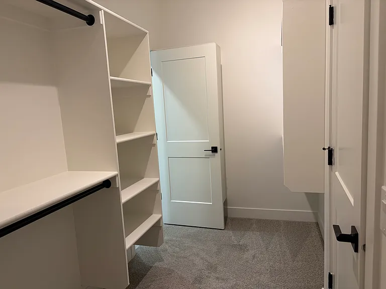 Master Closet has access door into master bath and main laundry room.