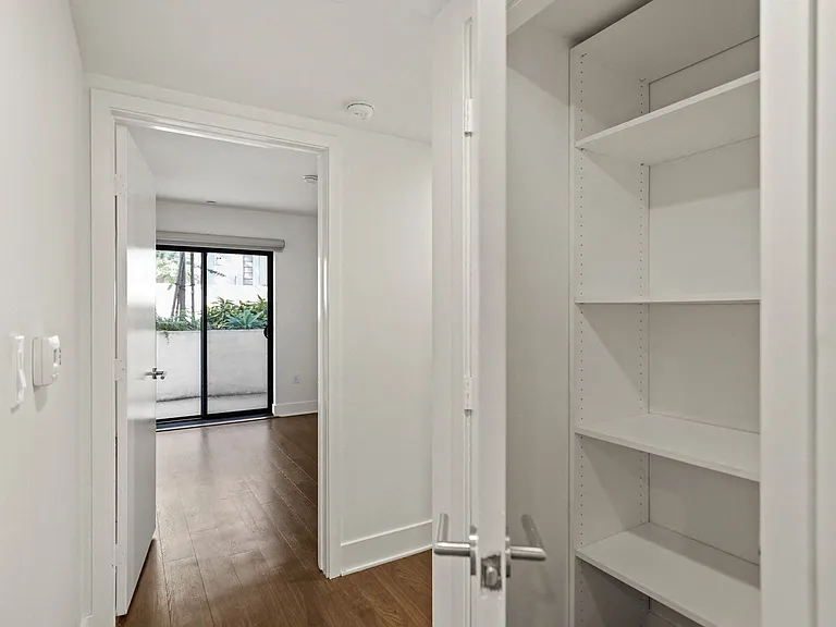 Hallway with Built-In Cabinet Storage