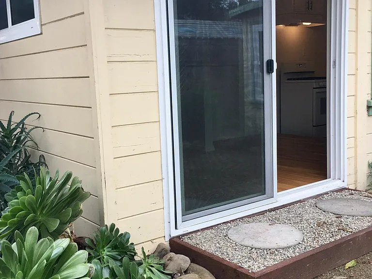 Sliding glass door to side garden.