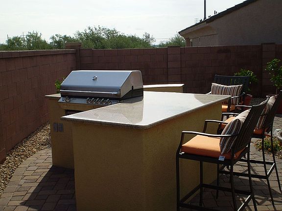 5 burner Turbo SS grill with Granite Counter top.