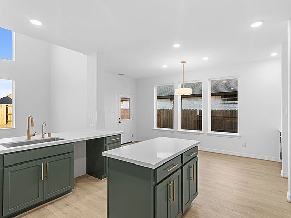 Kitchen. Sample product photo. Actual exterior and interior selections may vary by homesite. Photo m