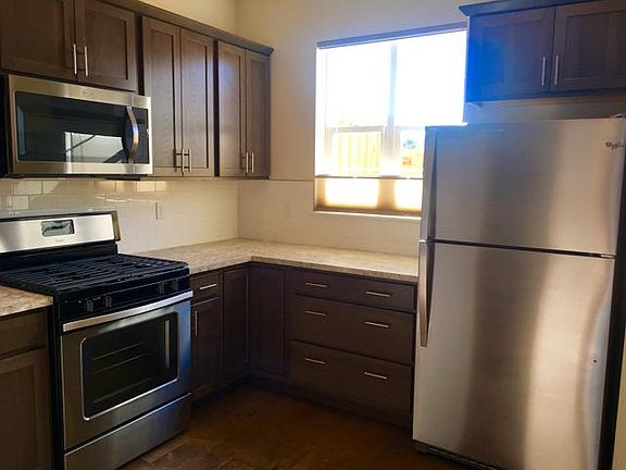 Stainless steel appliances, with kitchen window
