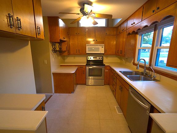 Kitchen with Oven, Over-Head Microwave and Dishwasher. Plenty of storage space for all your kitchen needs.