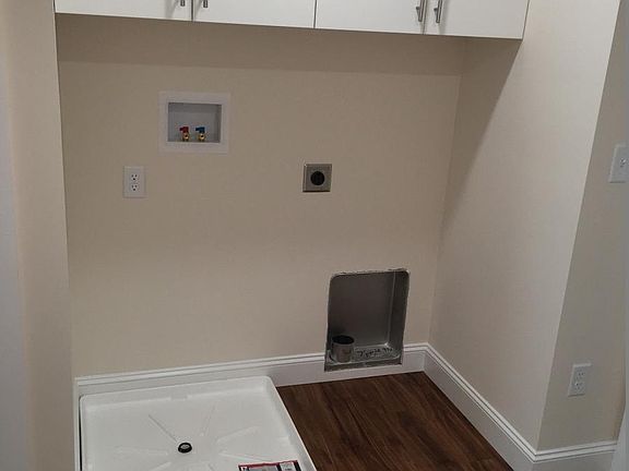 Laundry with storage above