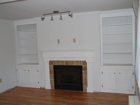gas fireplace, built in bookshelves