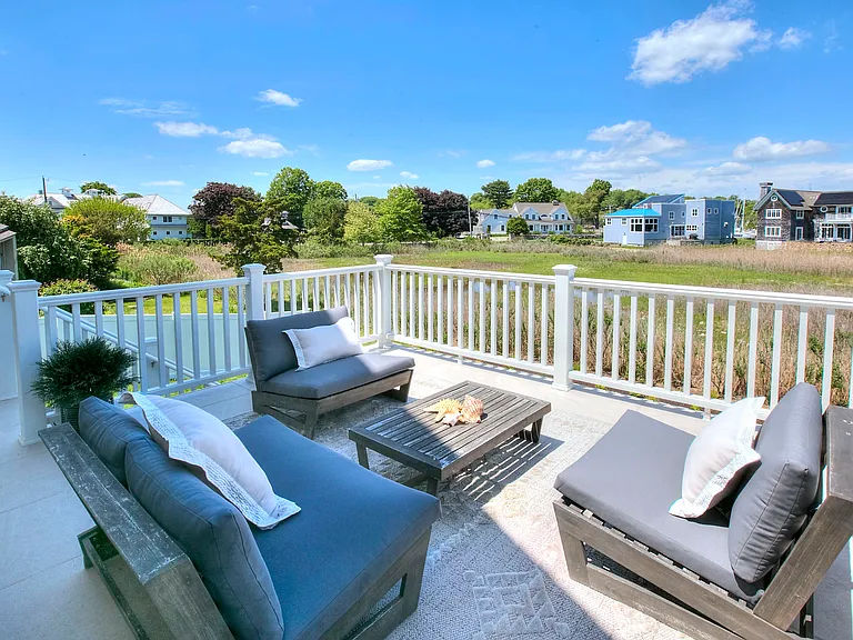 Take in natures beauty watching the birds and beauty of the marshlands while entertaining on the rear deck.