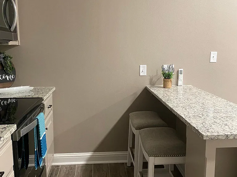 Nice bar for eating or "desk" work. There are USB outlets at end of bar and in the bedroom