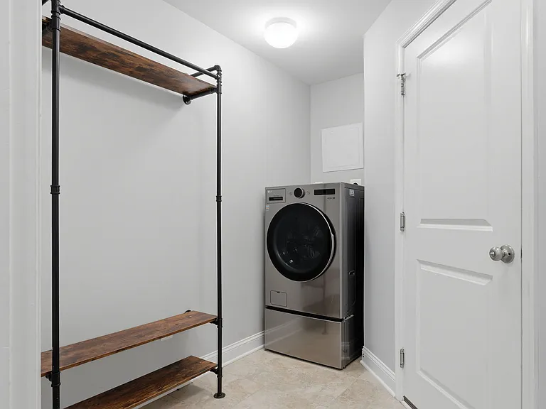 1st-floor laundry room leading to the garage.