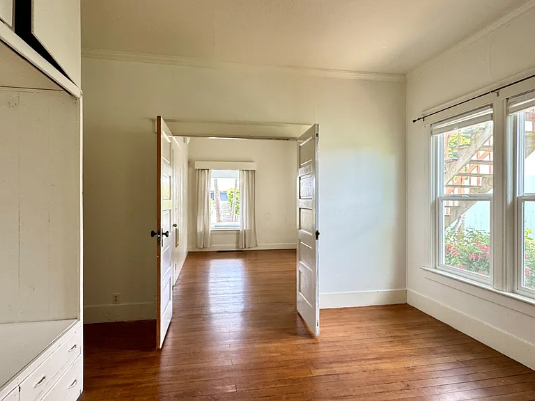 2 Downstairs bedrooms separated by double doors