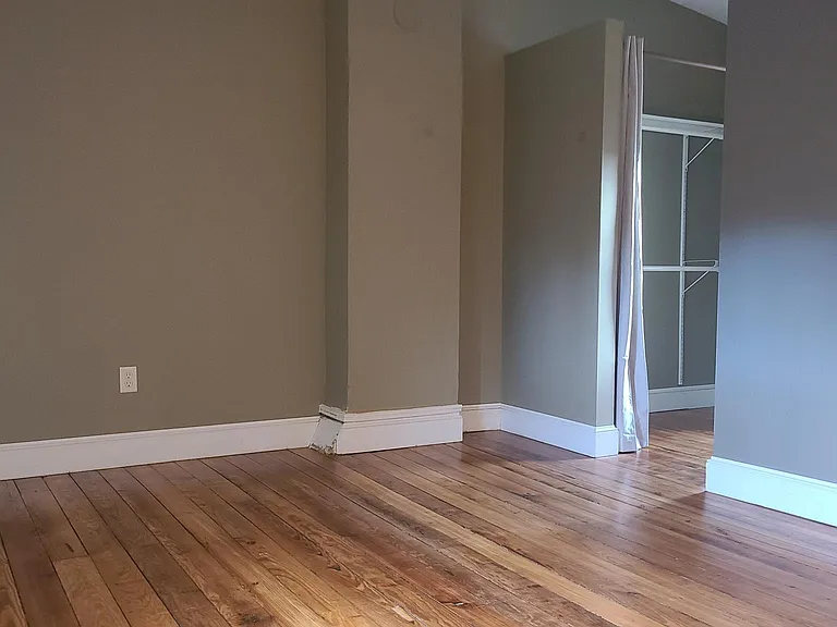 bedroom view of one walk in closet