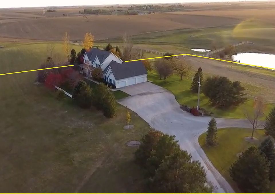 NOTE: The pond behind the house no longer exists.