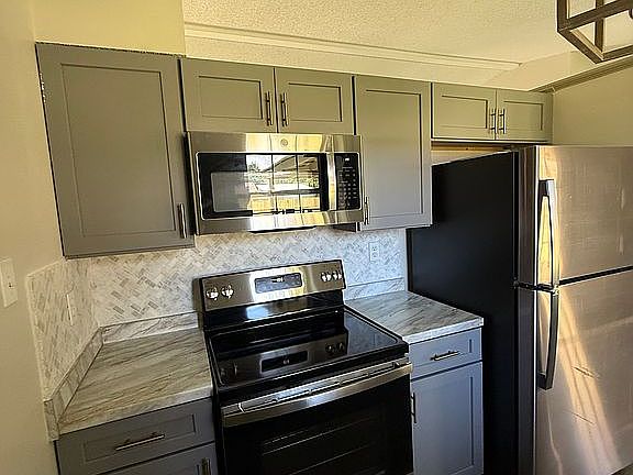 new appliances and cabinets
