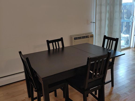 Dining area, furnishings included.