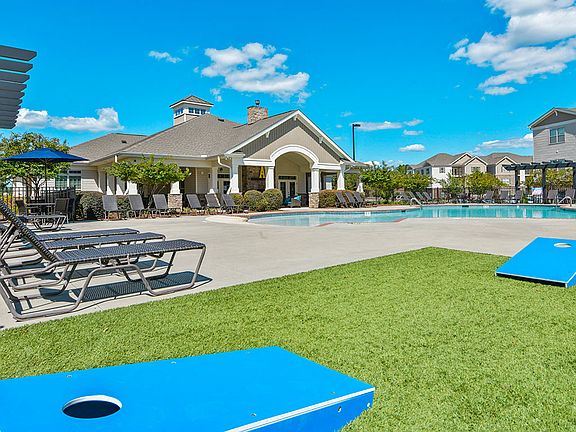 Corn Hole Game Beside Pool