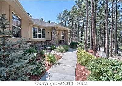 Enjoy the Peaceful Entrance to this Fabulous Home in the Trees