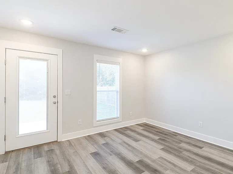Area off the kitchen large enough for a sitting room or kitchen table
