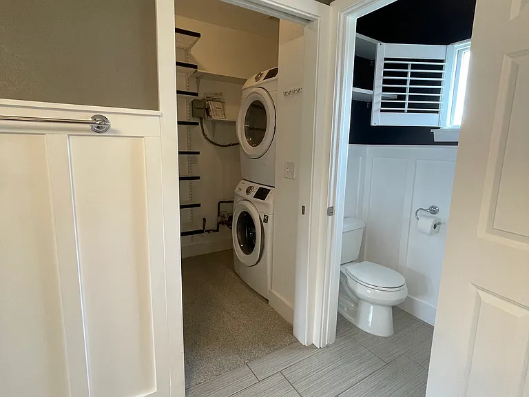 Stackable washer/dryer in primary bedroom closet