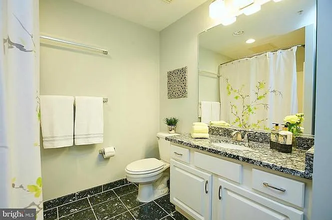 Bathroom w/large linen closet