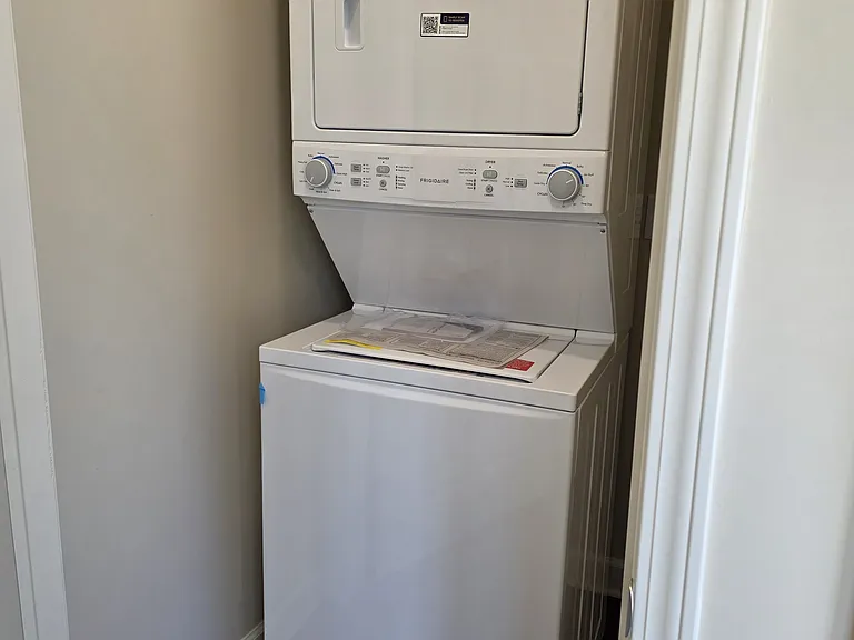 Washer and dryer in laundry closet, included in rent.