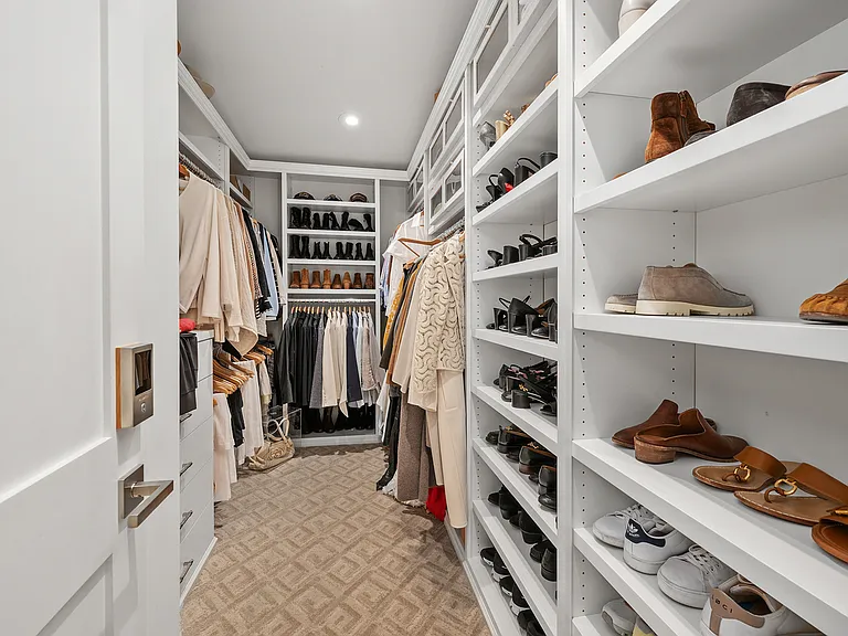 One side of walk in closet