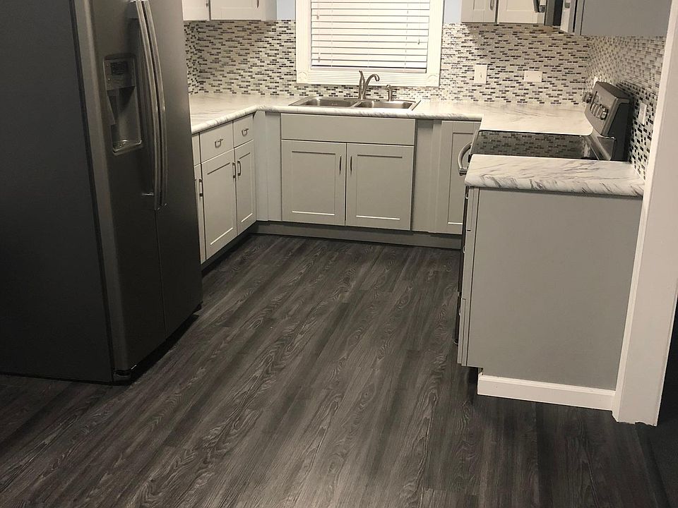 Newly renovated kitchen with Slate Finger Proof appliances and eat in kitchen!