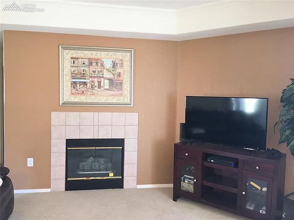 living room with gas fireplace