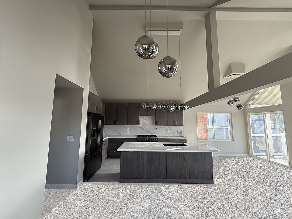 Custom remodeled kitchen with Bosch appliances. Lots of storage. Under cabinet lighting and new light fixtures.