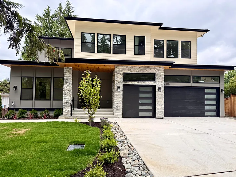 Main entry , 3 car garage