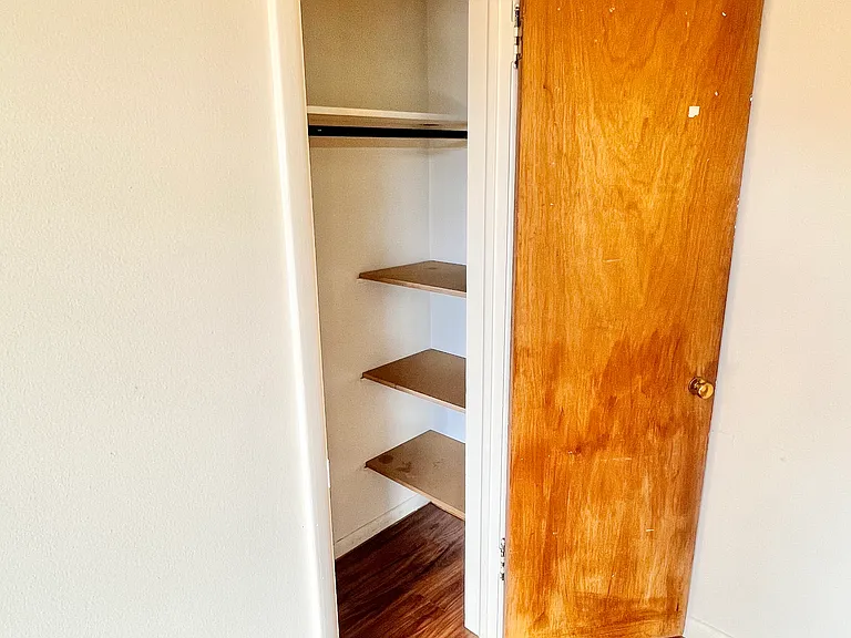Explore this functional and charming closet space with built-in shelving. Explore this functional and charming closet space with built-in shelving.