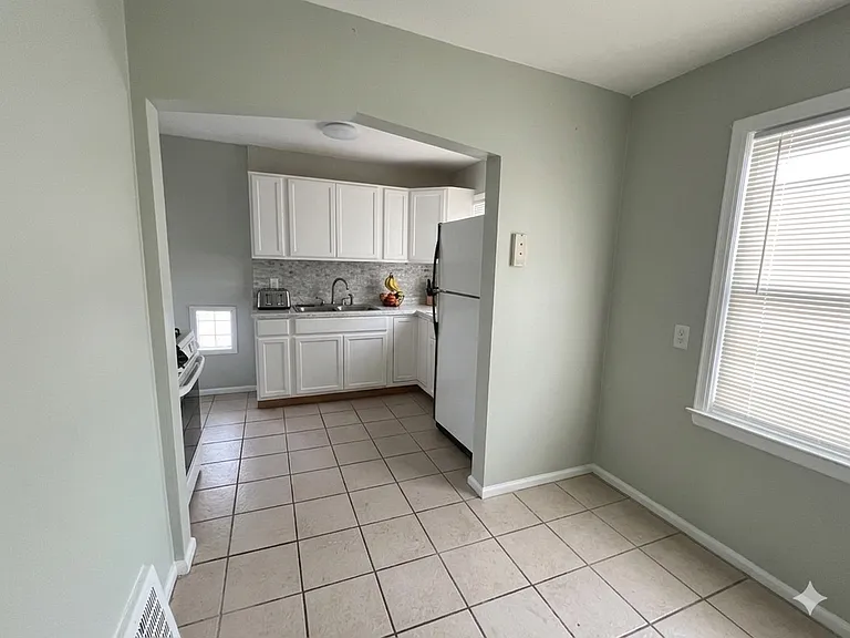 7637 Manor Ave — Photo 6