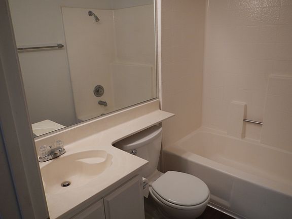 This is the Secondary bath. The Tub/shower in the Master Ba
