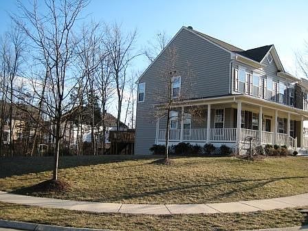 .30 acre lot, spacious wrap around Trex porch