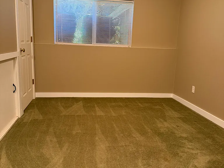 Downstairs office or bedroom. Wired for 5.1 sound. Was a gaming room/office.