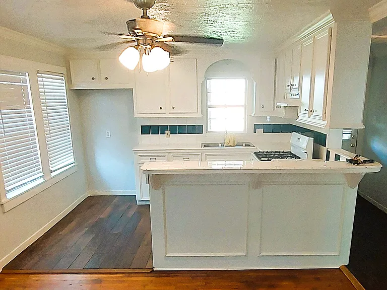 Breakfast bar area; can accomdate either two bar stools or three.