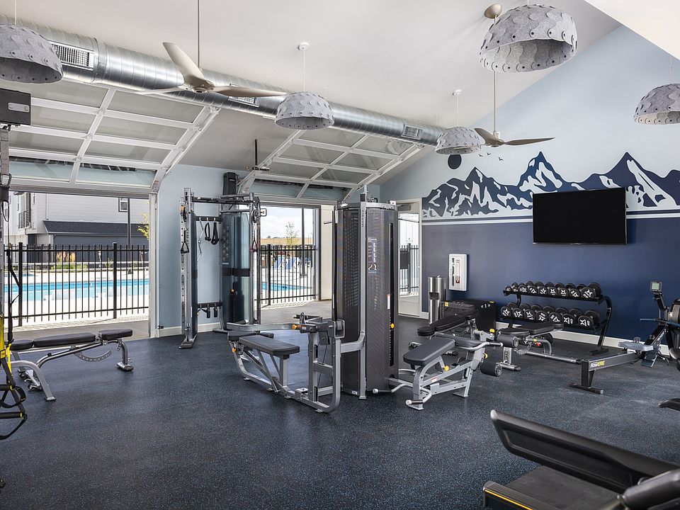 24 Hour Fitness Center with Garage Doors for Fresh Air