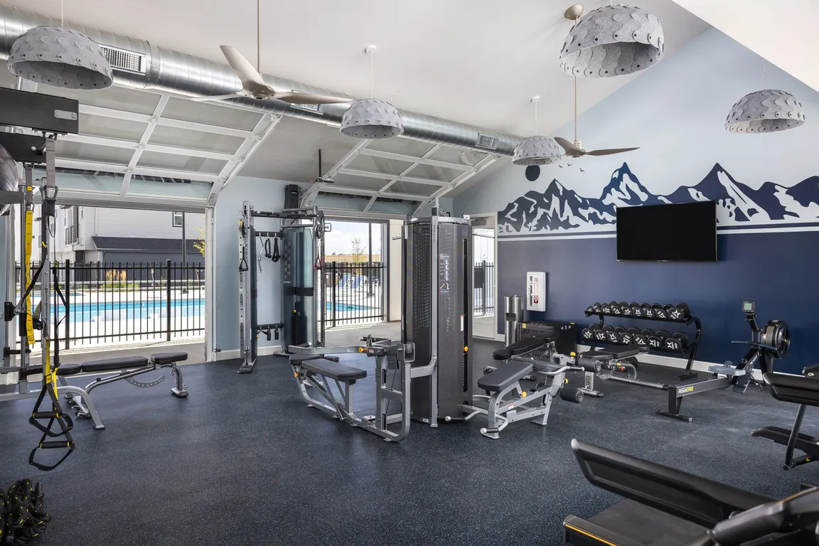 24 Hour Fitness Center with Garage Doors for Fresh Air